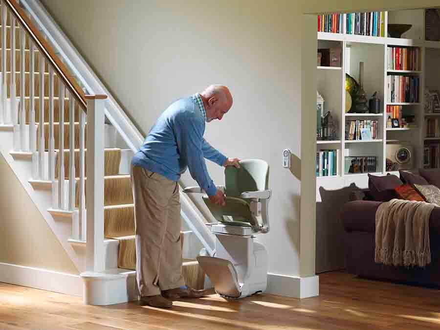 person using a stairlift